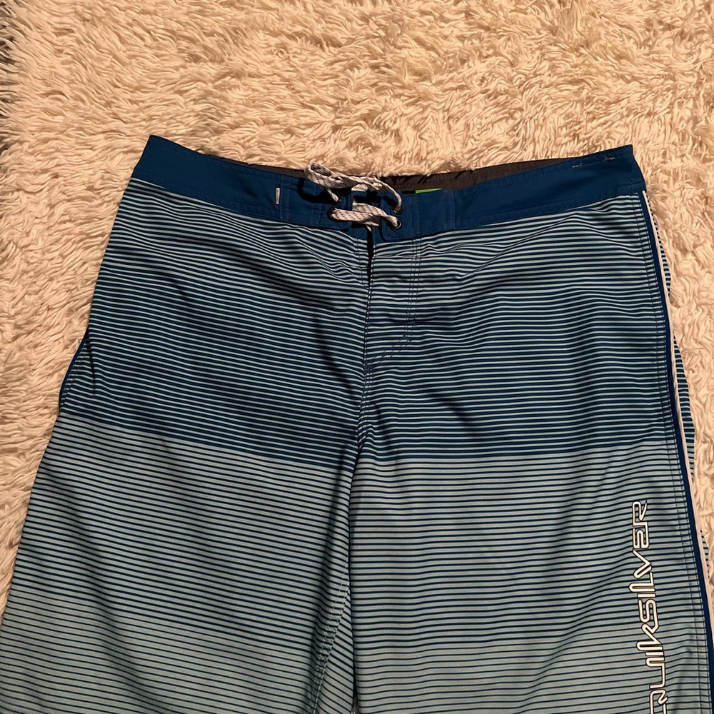 Mens Quiksilver board shorts.